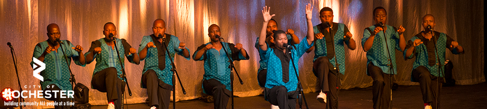 men dancing in a line