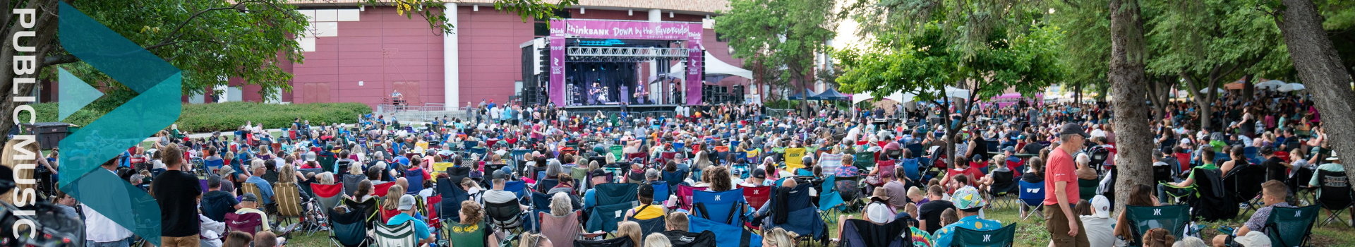 photo of crowd in front of stage