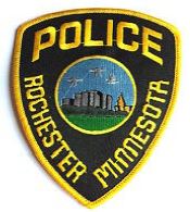 This is an image of the Rochester Police Department Badge which is sewn on the Rochester Police Department Uniform.